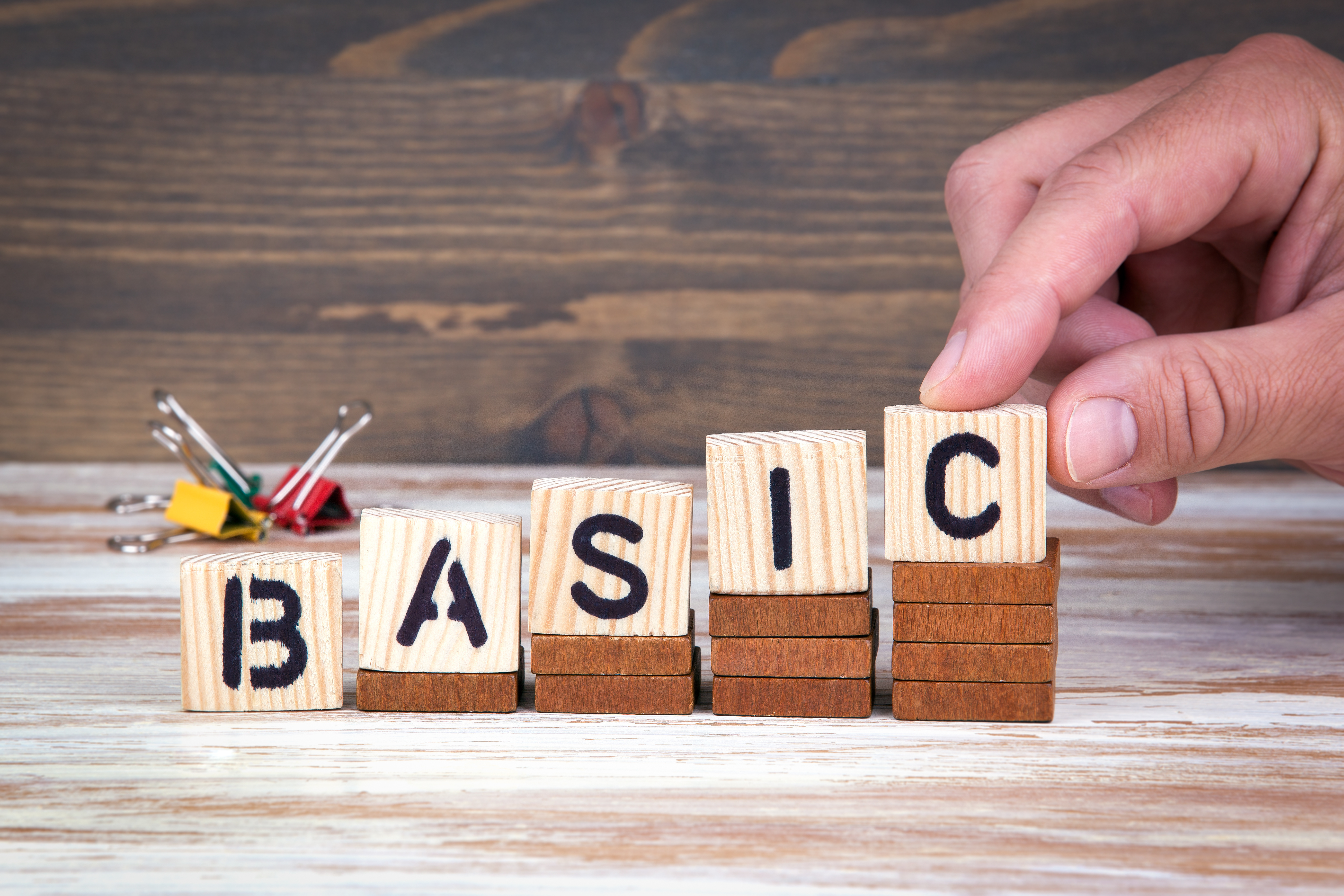 Basic concept. Wooden letters on the office desk, informative and communication background. Basic concept. Wooden letters on the office desk, informative and communication background.